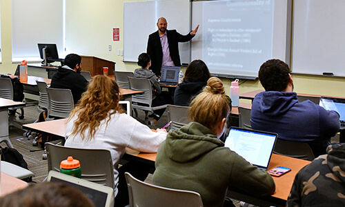Professor Patrick Mcgrain teaching a class